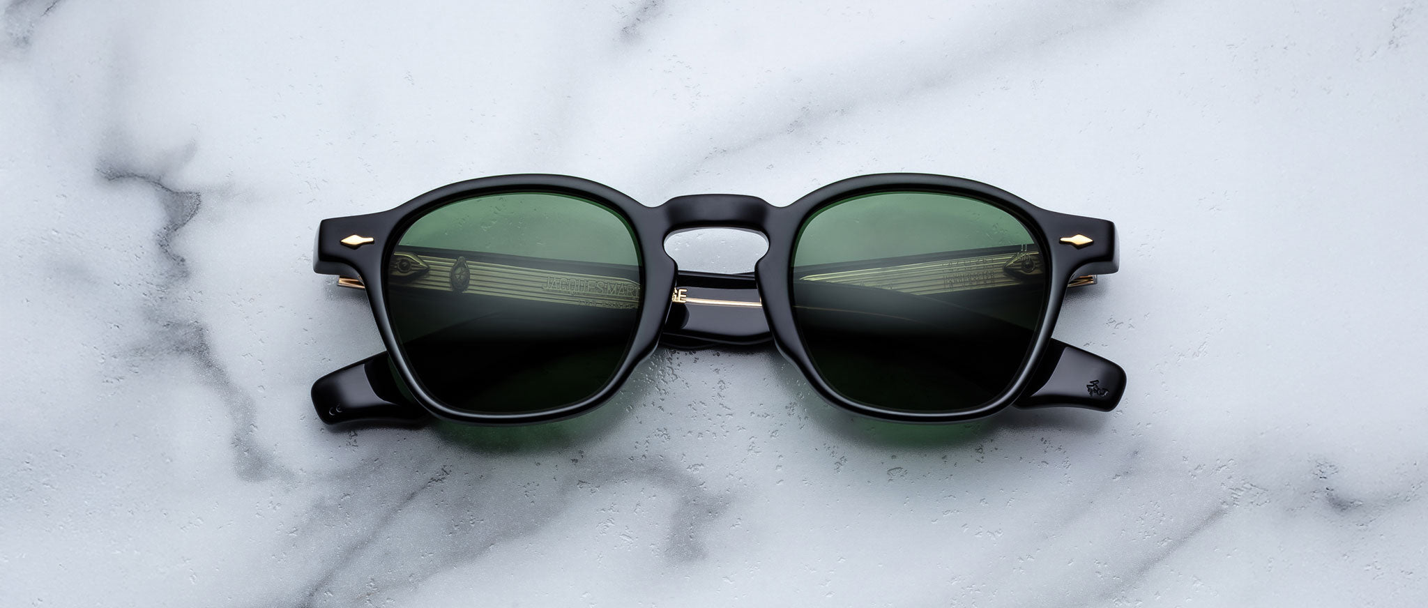 Jacques Marie Mage Zephirin 47 black sunglasses with green lenses, top view showing full frame and lens color.