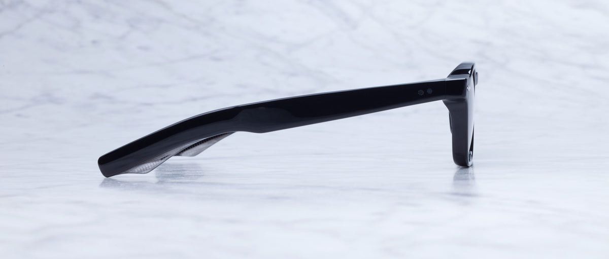 Jacques Marie Mage Zephirin eyeglasses, side profile view with folded arms, model name visible.