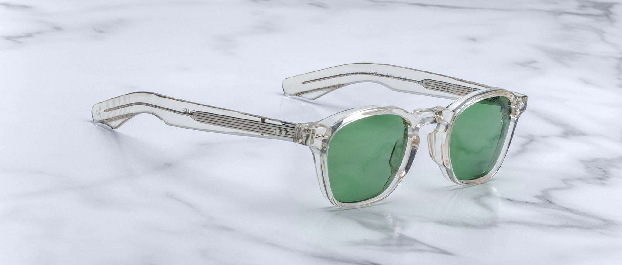 Jacques Marie Mage Zephirin 47 sunglasses with green lenses, front view, product displayed on a flat surface.
