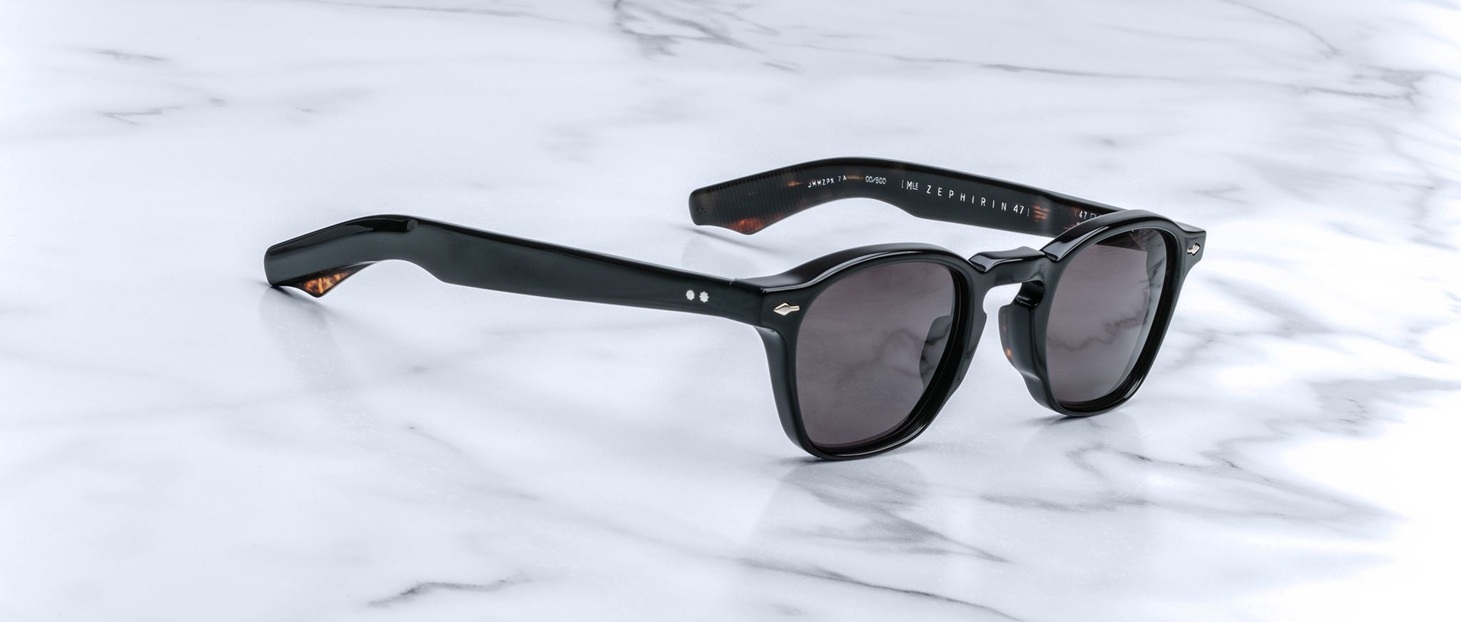 Jacques Marie Mage Zephirin 47 black sunglasses with dark lenses shown from the side.