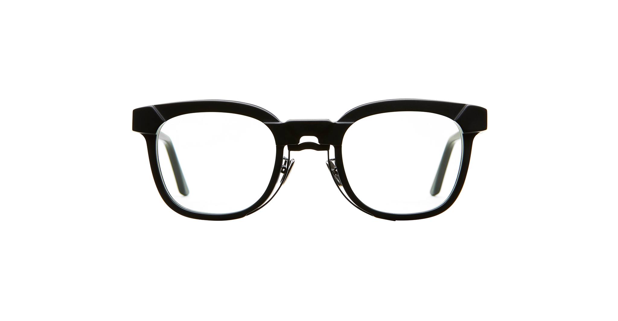 A pair of black, thick-rimmed eyeglasses with clear lenses, shown from the front against a plain white background.