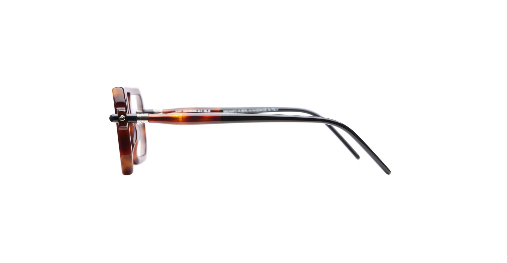Side view of KUBORAUM P8 tortoiseshell eyeglasses with black acetate arms, featuring the brand and model clearly.