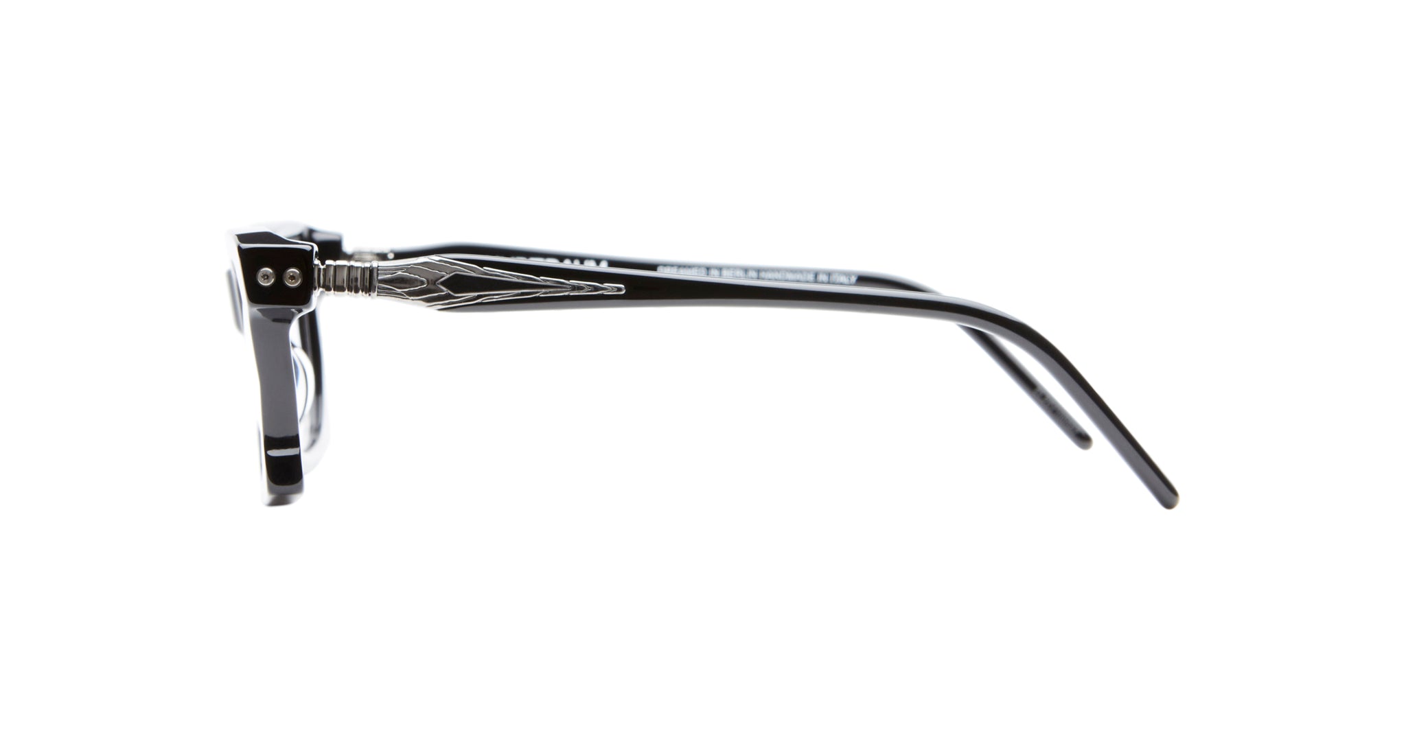 Side view of Kuboraum D75 black eyeglasses featuring a silver engraved metal detail on the temple arm, photographed against a white background.