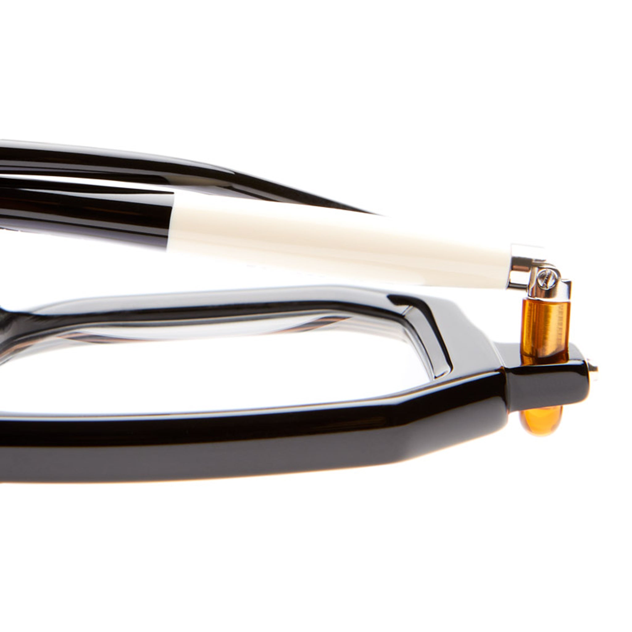 Close-up of KUBORAUM P8 black eyeglasses frames showing white and gold hinge detail. Brand and model name visible.