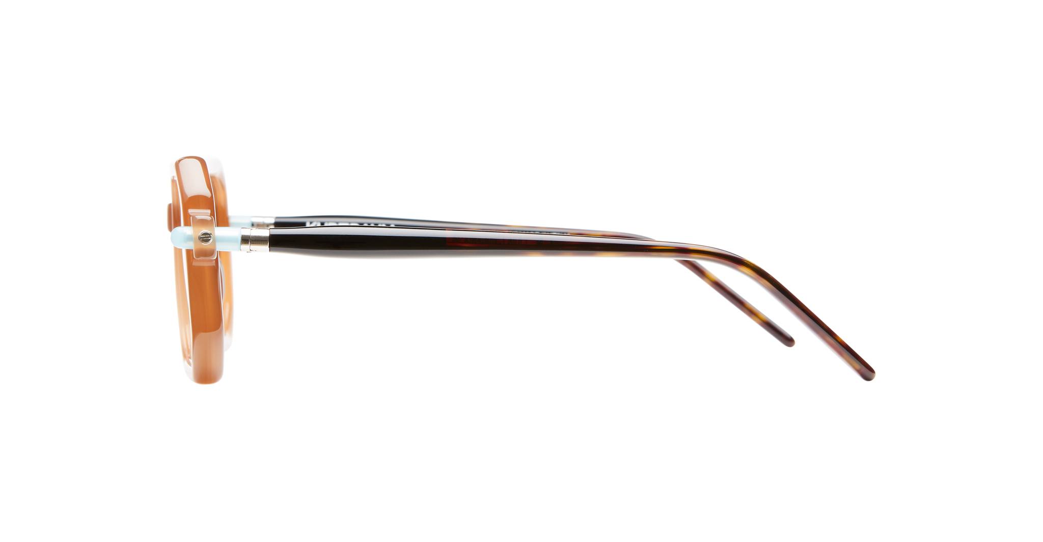 Side view of the Kuboraum P8 eyeglasses with brown translucent frames and dark brown temples, shown on a white background.