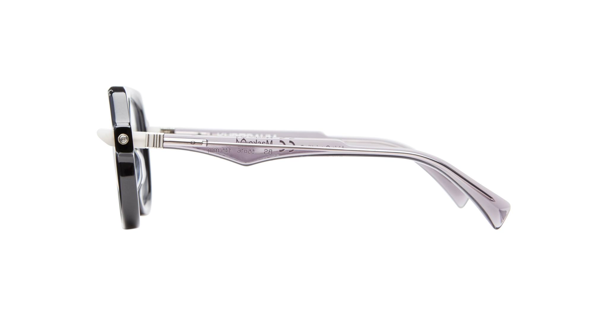 A side view of the Kuboraum Q4 eyeglasses featuring black frames and thick, light purple arms against a plain white background.
