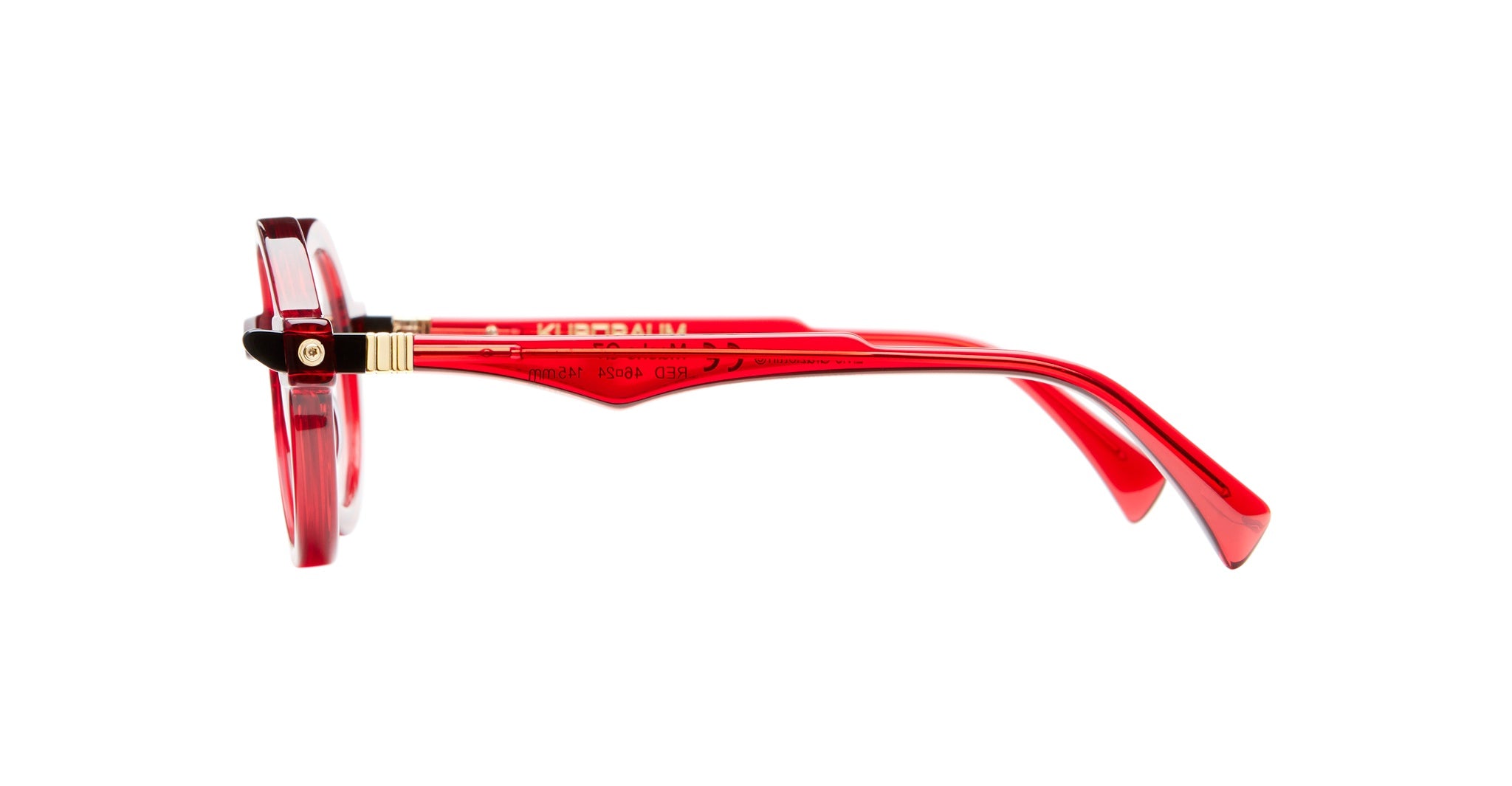 Side view of Kuboraum Q7 eyeglasses featuring bold, round red frames and thick arms, displayed against a white background.