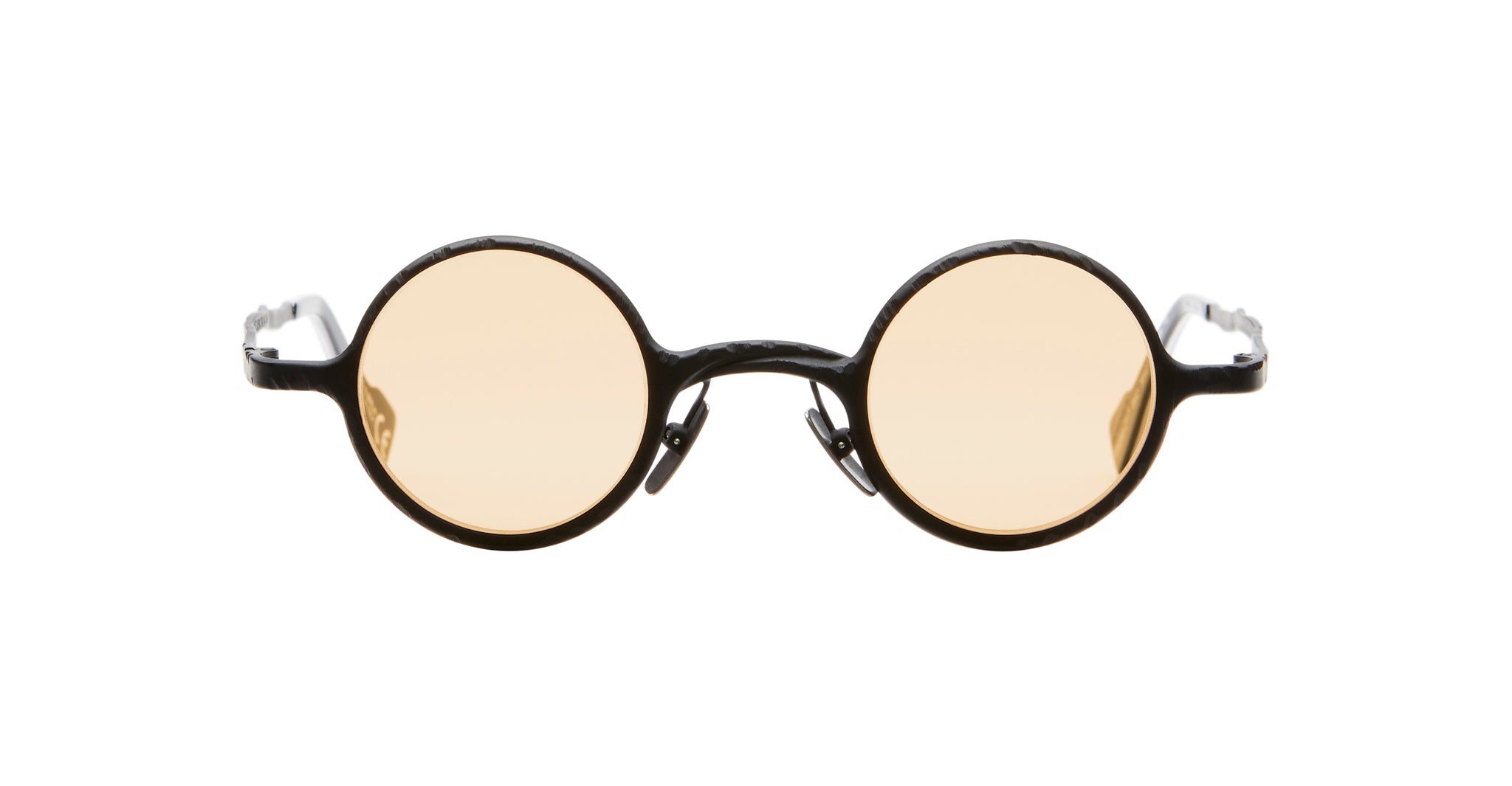 KUBORAUM Z17 round black-frame eyeglasses with light yellow lenses, front view.