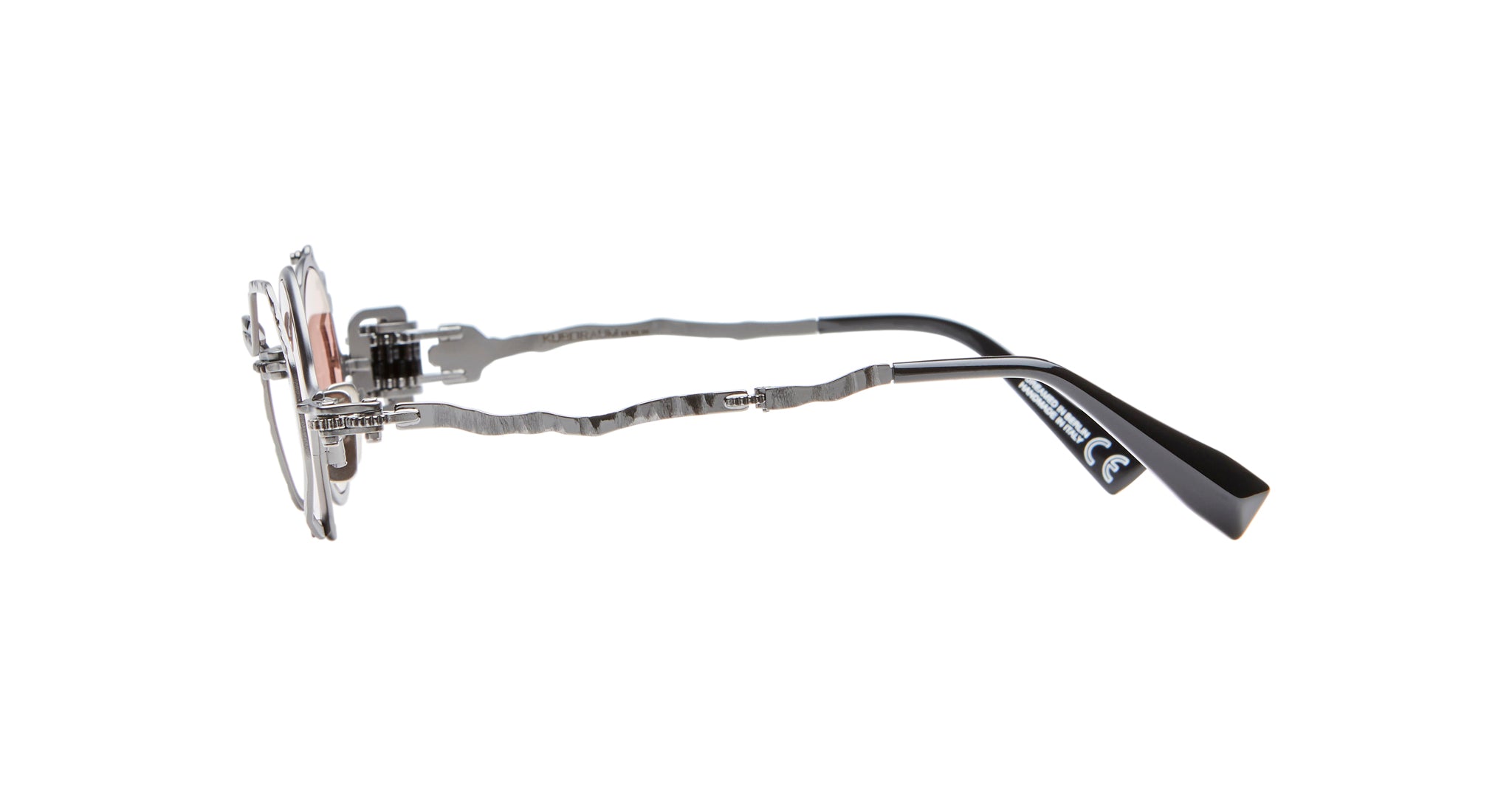 Side view of Kuboraum Z50 eyeglasses with metallic, wavy-textured arms and black tips on a white background. The steampunk-inspired design features visible screws and hinges by the lenses.