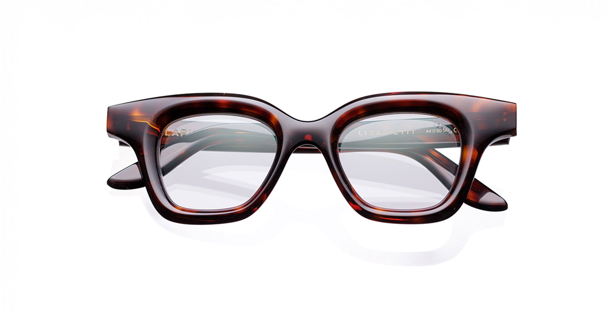 The Lapima Lisa Petit 44 features rectangular tortoiseshell eyeglasses with thick, glossy square acetate frames and rounded edges, handcrafted in Brazil. Shown with clear lenses against a white background.