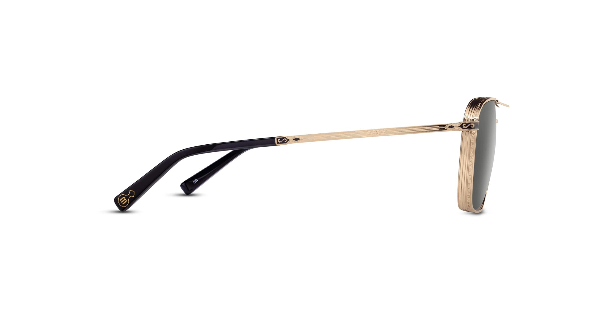 Side view of Matsuda M3135 sunglasses with thin gold metal frames, black temples, and dark lenses. The temple tips display a small decorative logo.