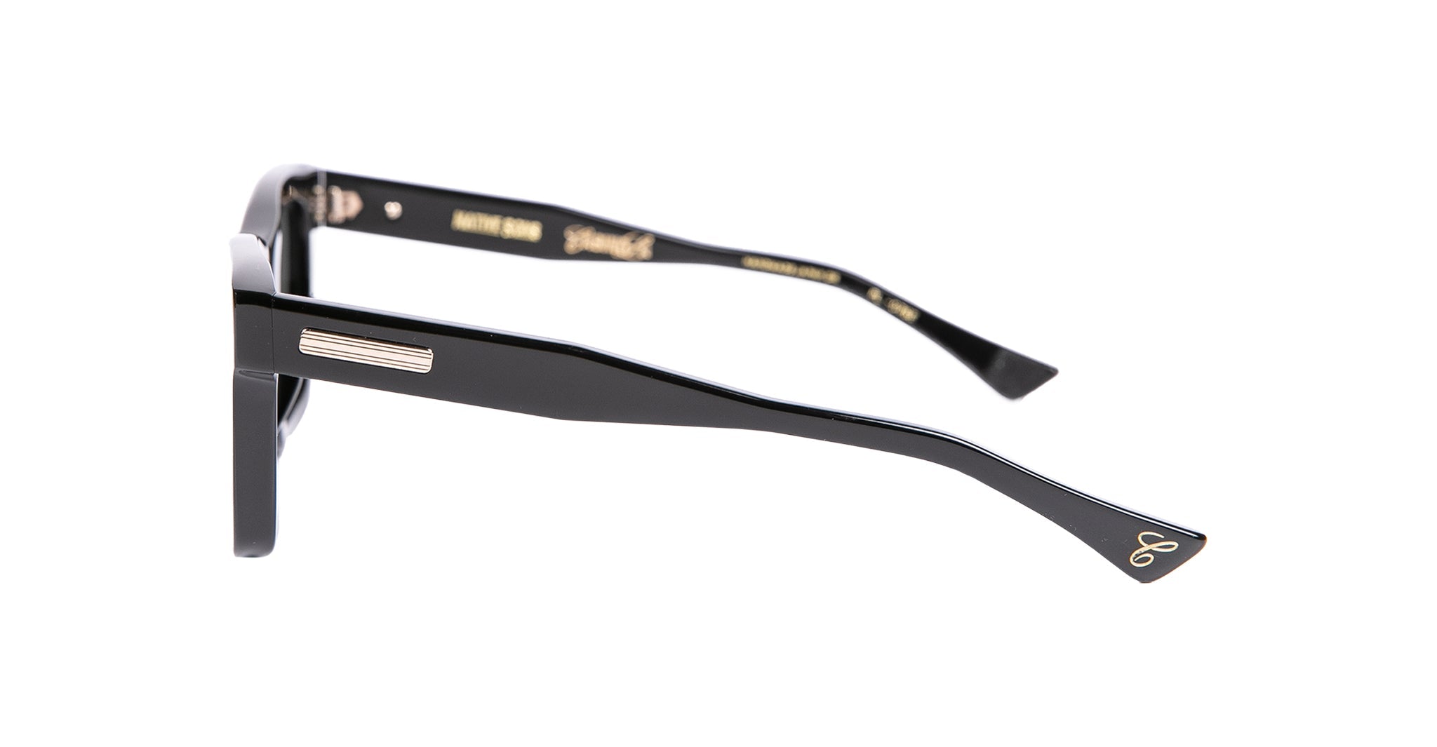 Side view of Casinola x Native Sons “The E’s” (The Eddie) black Wellington frames with gold accents and decorative temple details, crafted in premium Takiron acetate, shown on a white background.