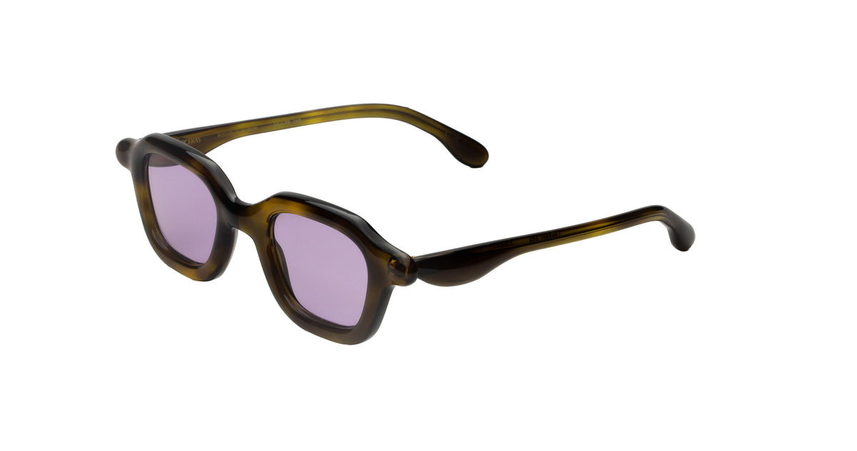 Paloceras A2 sunglasses with thick, rounded dark brown and amber tortoiseshell frames and light purple tinted lenses.