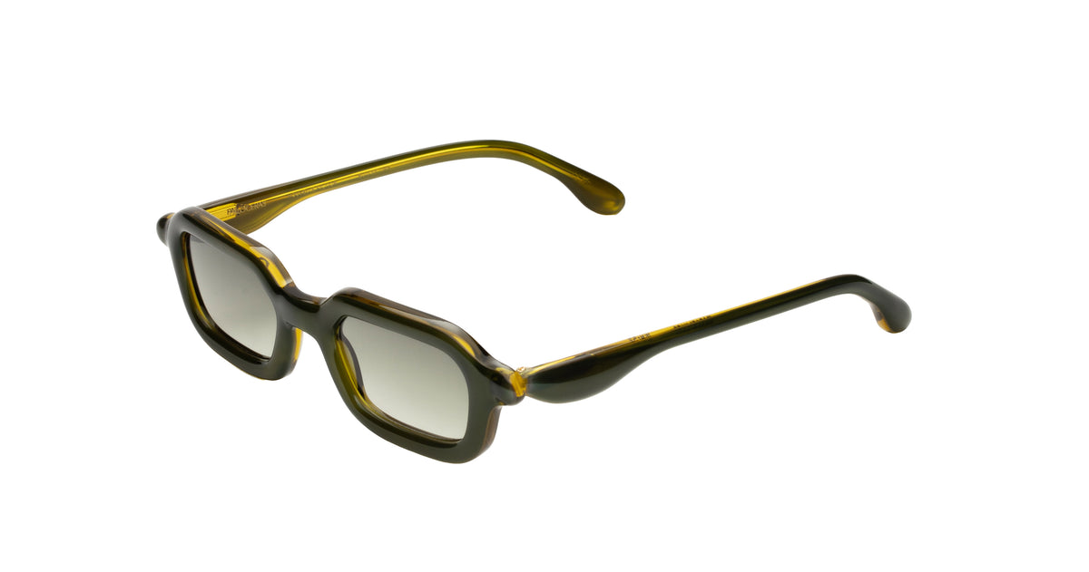 Paloceras Nouvelle Fiction S2 Wasabi Haze sunglasses in a translucent olive green frame with golden yellow highlights, softly rectangular rims, and pale green lenses, three-quarter view