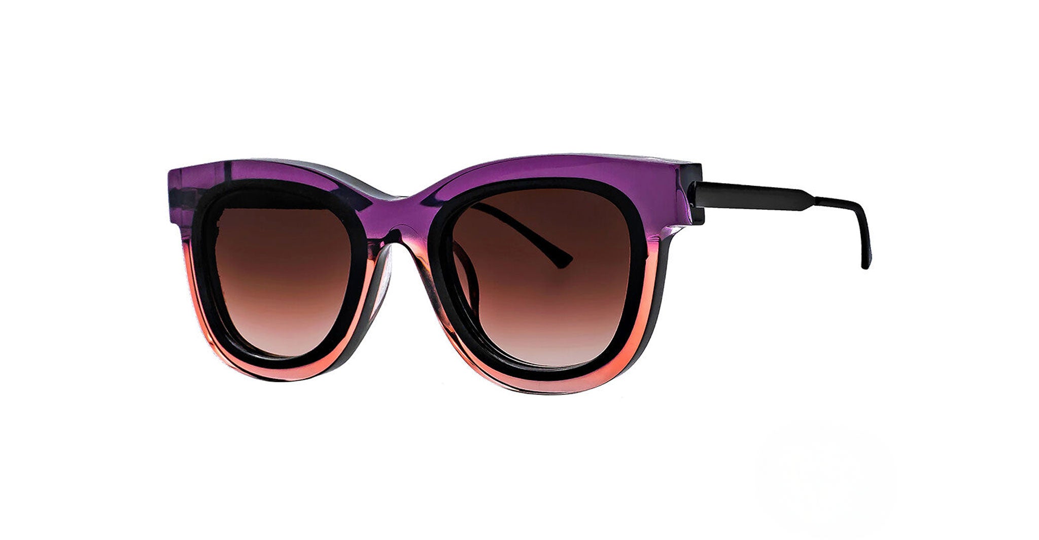 A pair of stylish sunglasses with thick, cat-eye frames that fade from purple at the top to pinkish-orange at the bottom, and dark gradient lenses.