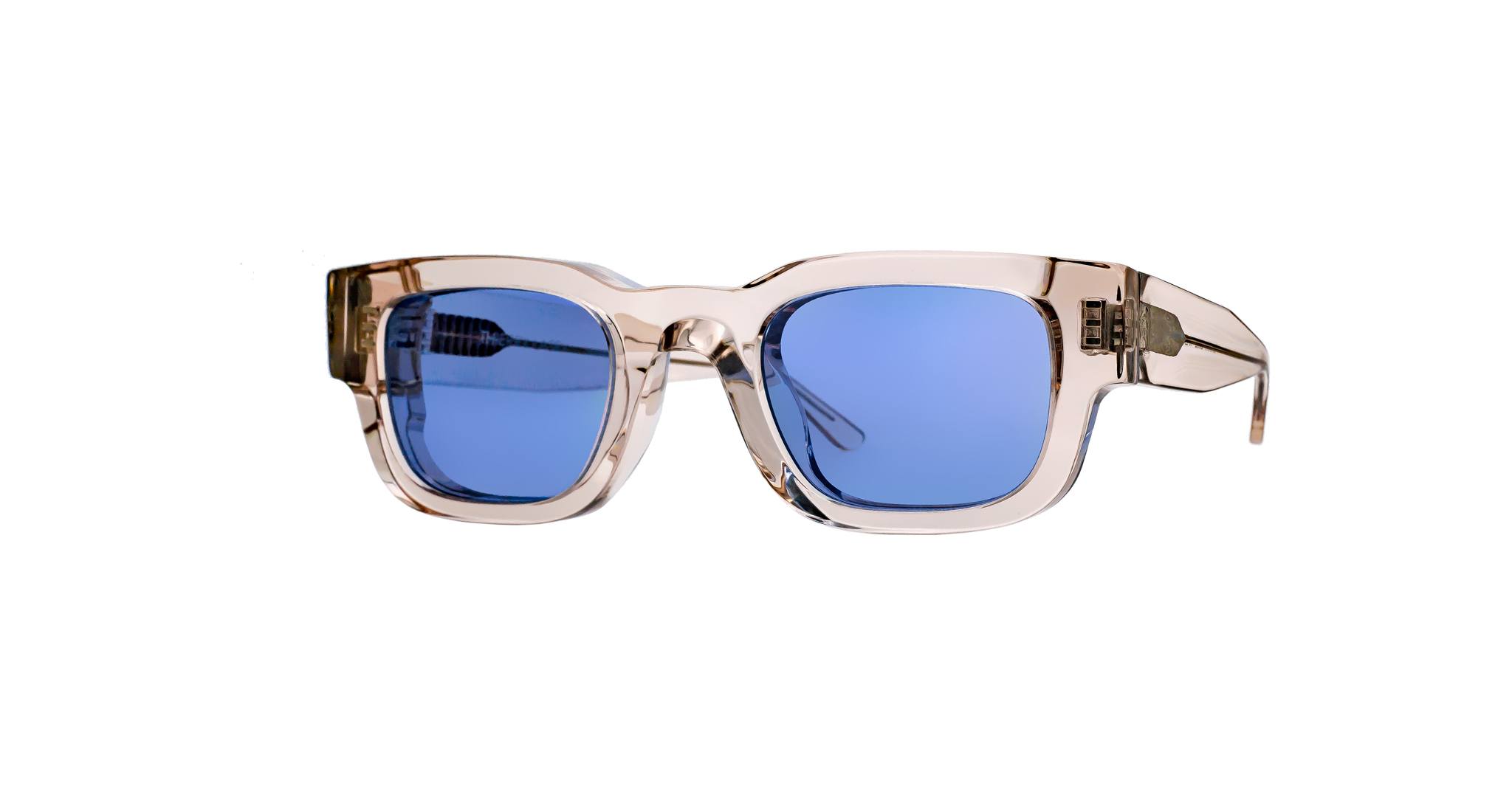 Thierry Lasry Foxxxy clear-frame sunglasses with rectangular blue polarized lenses, front view.