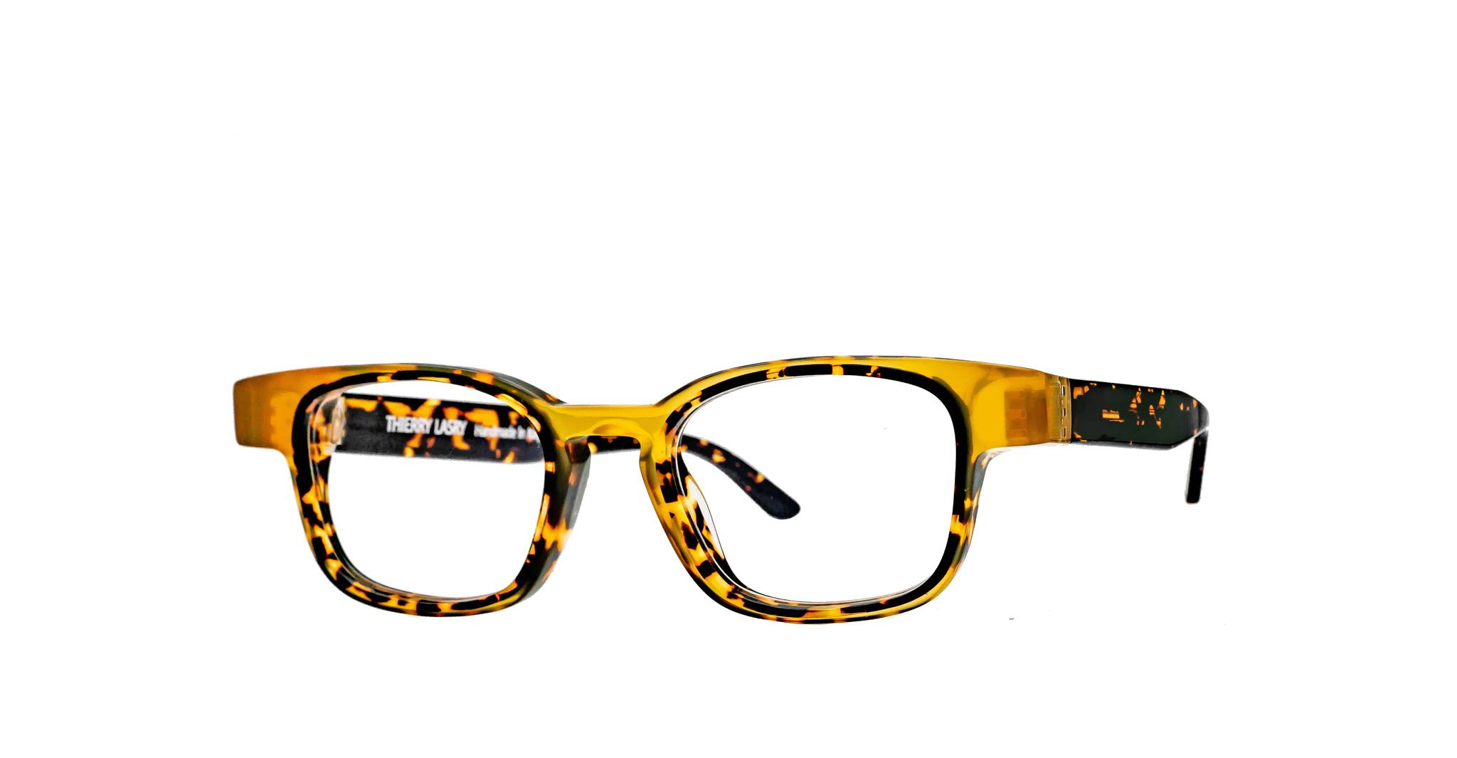 A pair of rectangular, thick-framed eyeglasses with a yellow and black tortoiseshell pattern, displayed on a white background.