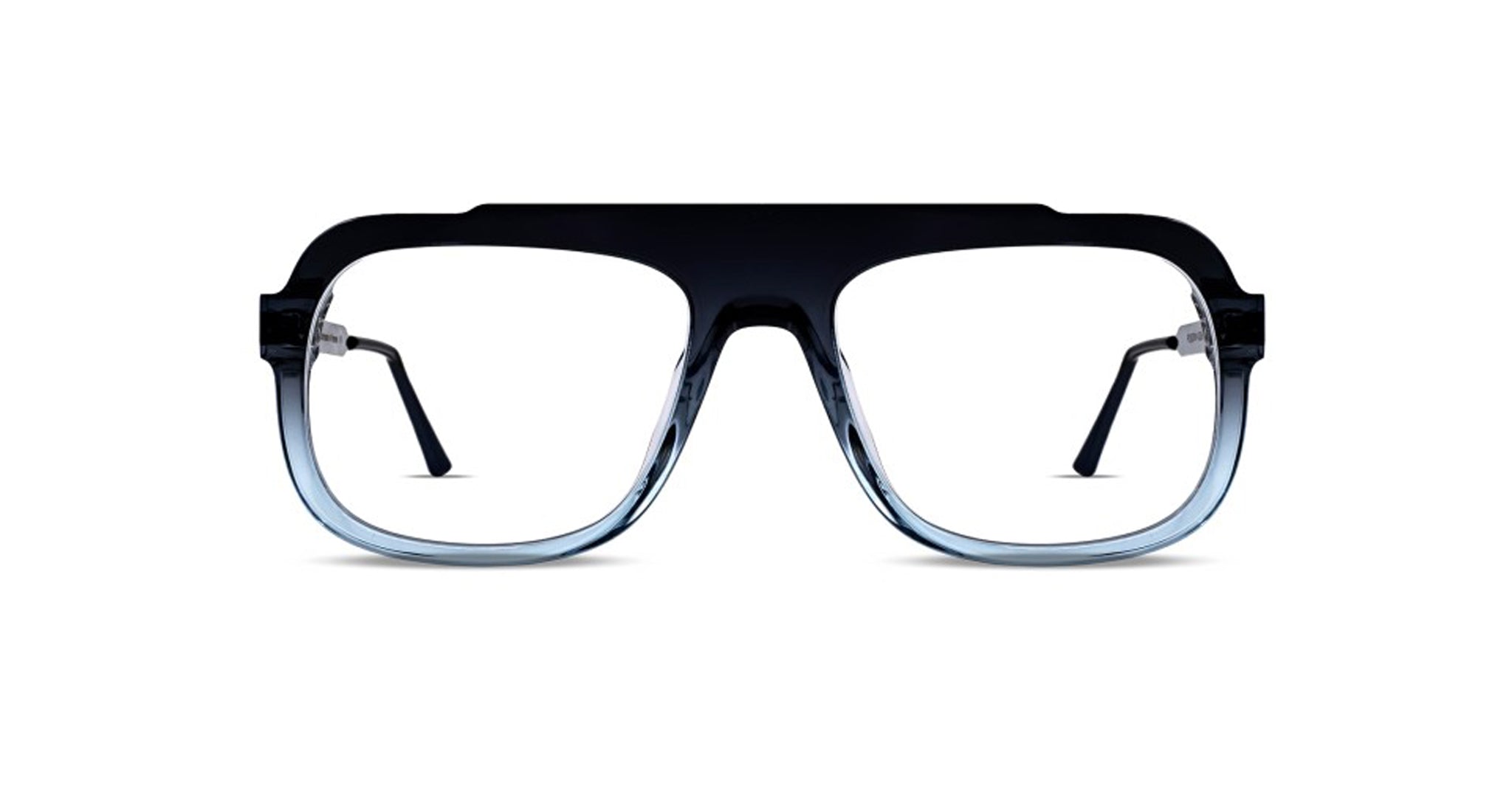 Thierry Lasry Poisony eyeglasses feature oversized, square rims with bold black frames that fade to a translucent light blue at the bottom, displayed on a white background.