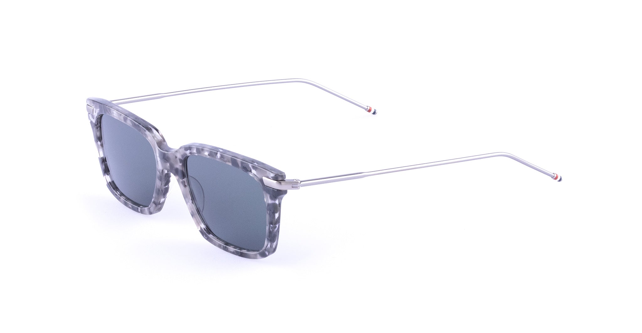 Thom Browne 701 gray tortoiseshell square sunglasses with thin metal arms and dark lenses, shown from a side angle.