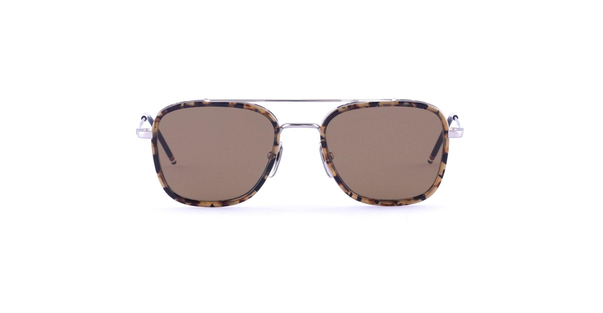 Front view of Thom Brown 800 Sunglasses in Brown Tortoise, featuring square tortoiseshell-patterned frames, brown lenses, and a thin metal bridge, set against a white background.