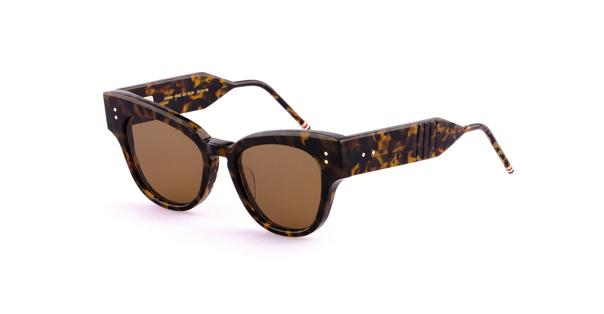 Thom Browne 925 round tortoiseshell sunglasses with brown lenses and thick frames, front view.