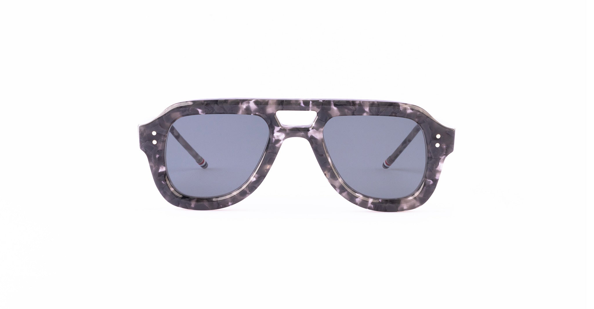 A pair of Thom Browne Aviator sunglasses with a thick, marbled gray and black frame and dark tinted lenses.