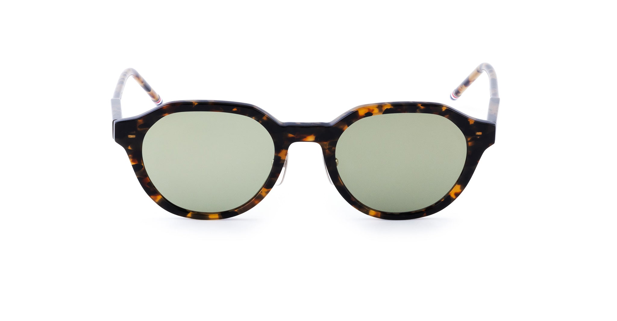 Tortoiseshell-patterned Thom Browne Sunglasses with round green-tinted lenses.