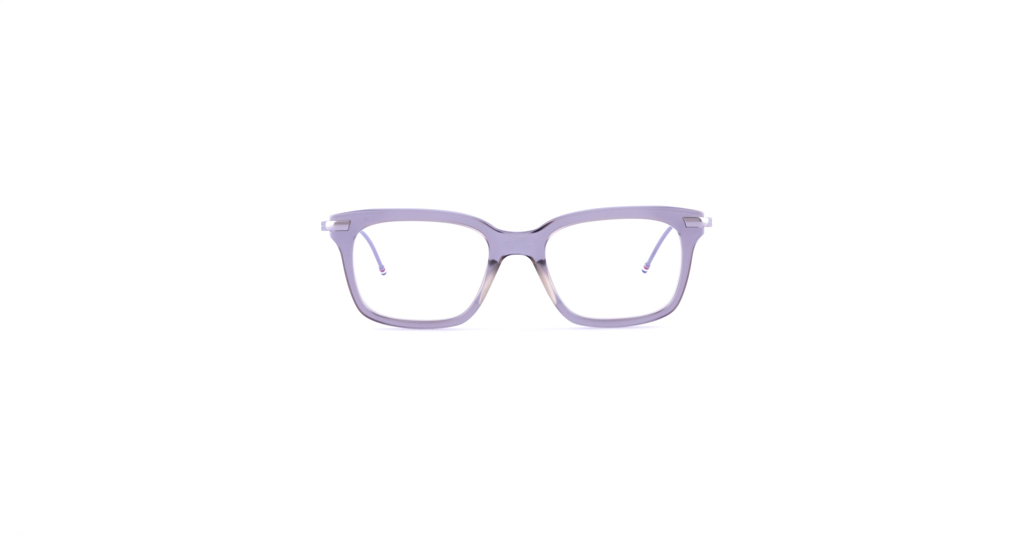 Front view of Thom Browne 701 rectangular lavender eyeglasses with clear rims.