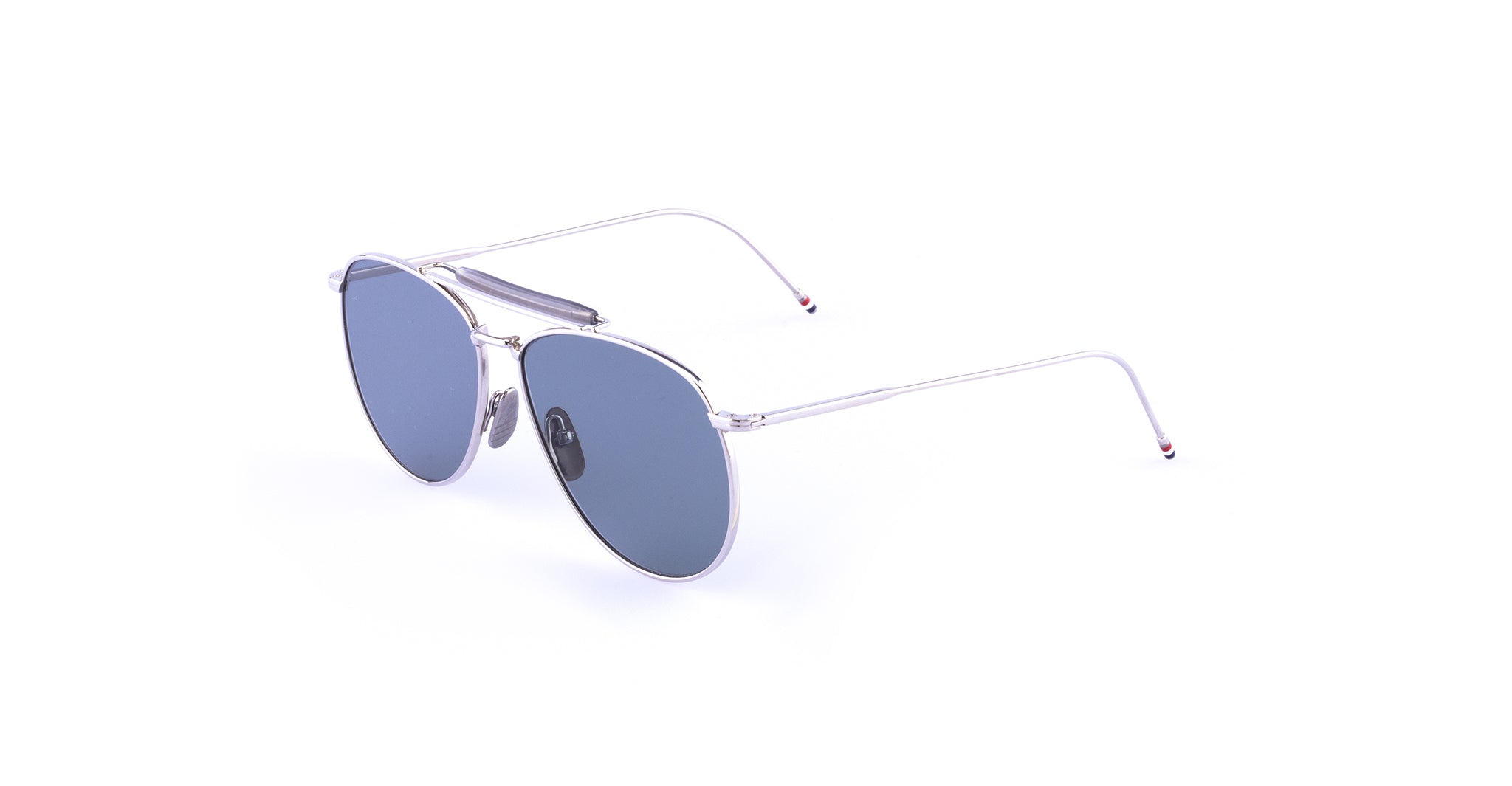 Thom Browne 015 sunglasses with a silver frame and round blue-tinted UV lenses, front view.