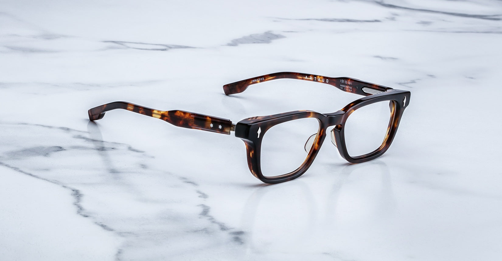 Angled view of the Jacques Marie Mage Artaud eyeglasses in colorway Havana