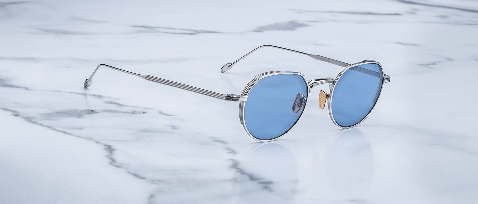 Angled view of the Jacques Marie Mage Fontana style sunglasses in silver