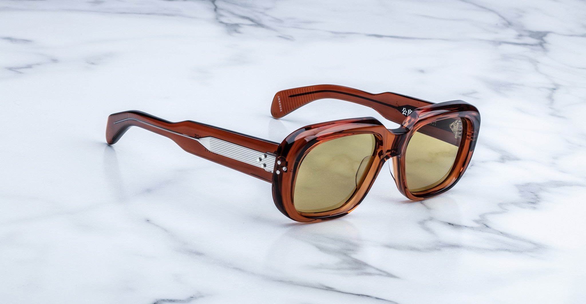Jacques Marie Mage Kobo square sunglasses with light brown lenses, front view.