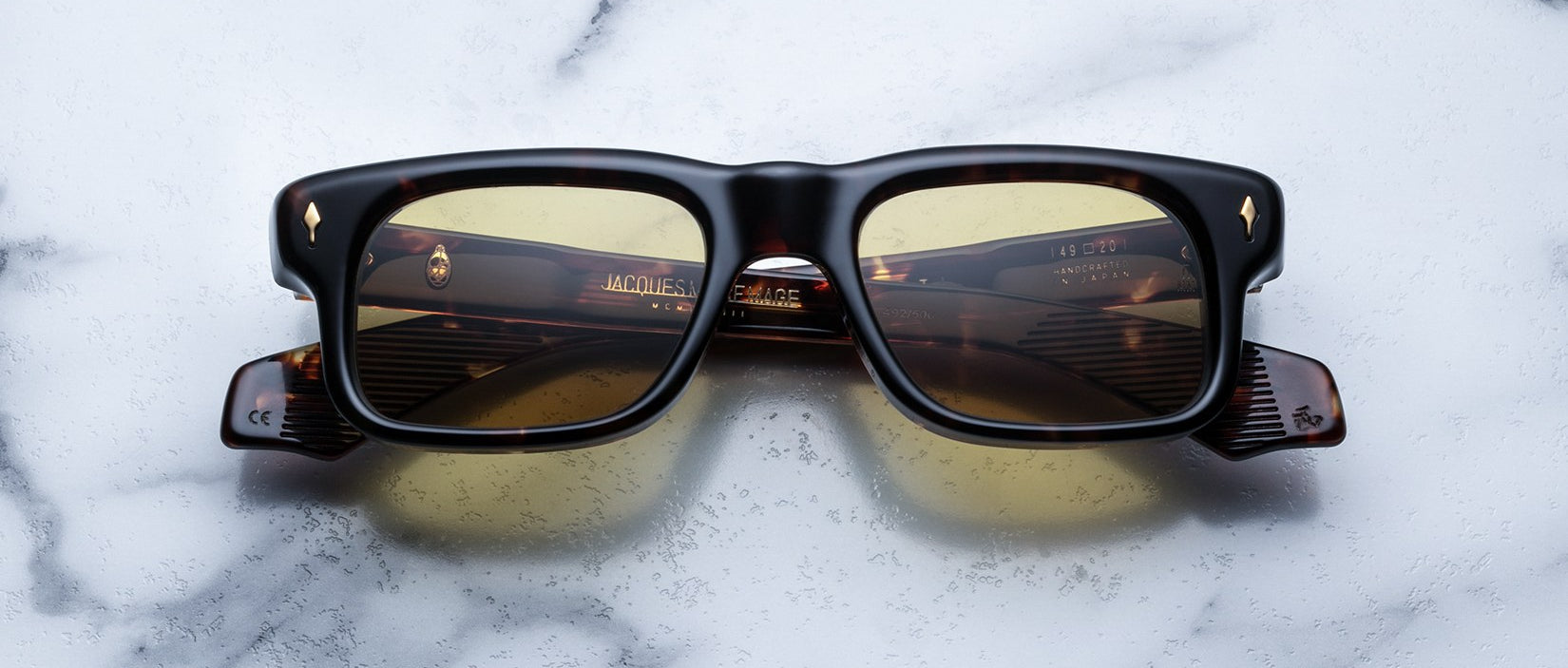 Jacques Marie Mage Saint rectangular tortoiseshell sunglasses with yellow lenses, top view.