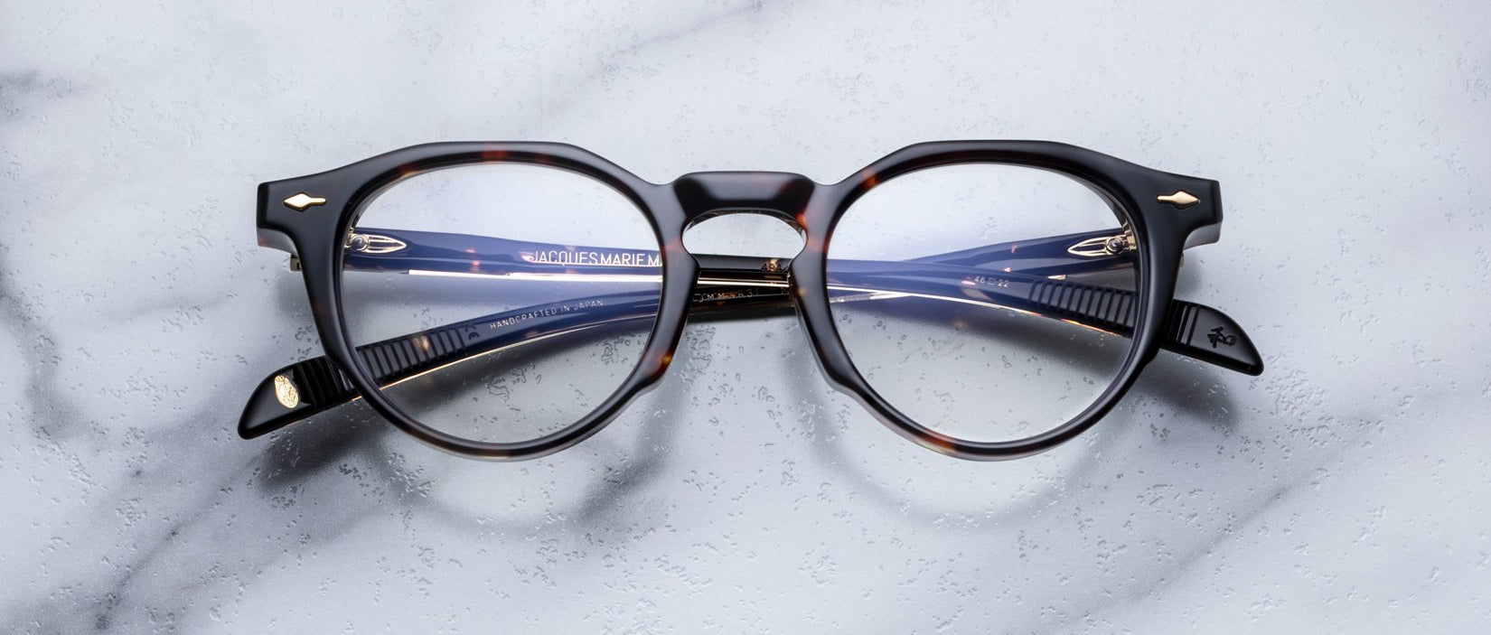 Jacques Marie Mage Sheridan in Dark Havana, rounded Boston lens shape acetate frame with keyhole bridge and arrowhead pins