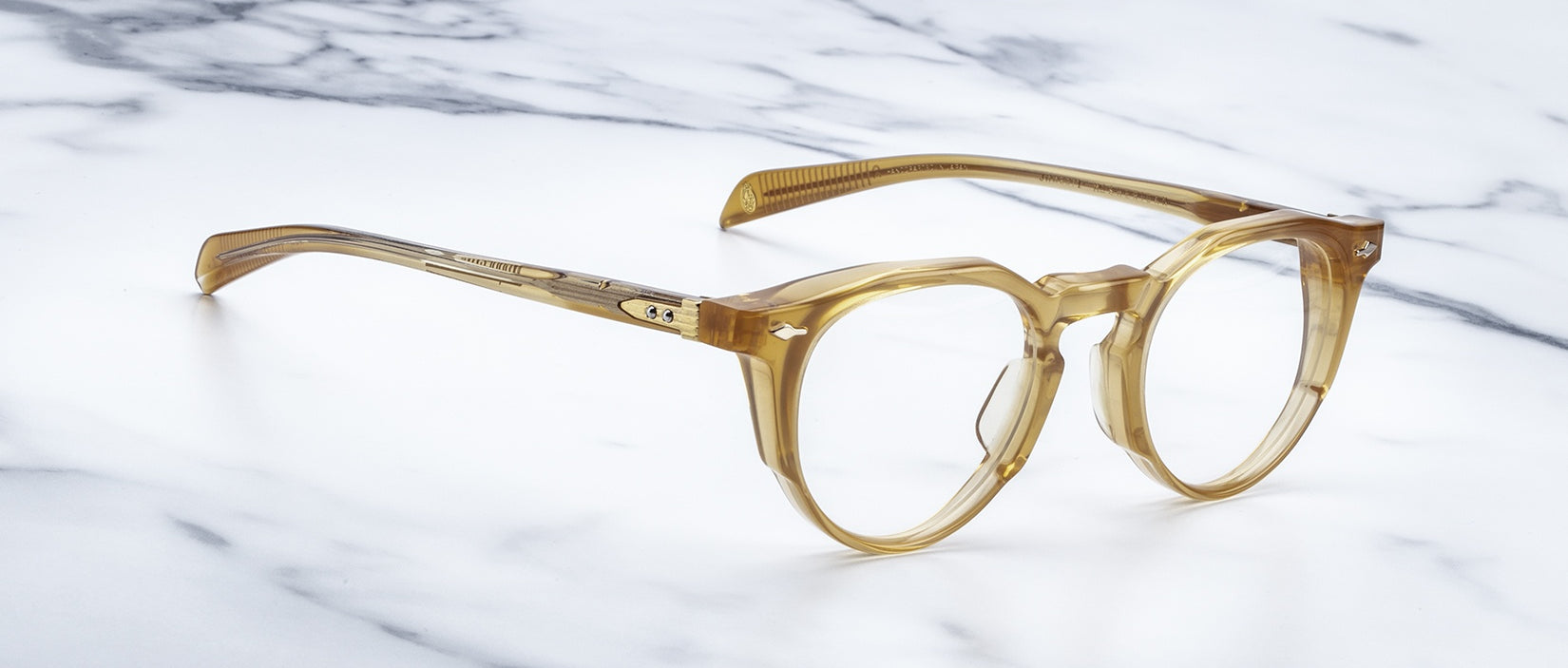 Jacques Marie Mage Sheridan in Marigold, warm amber acetate frame with modified Boston lens shape and keyhole bridge, front angled view