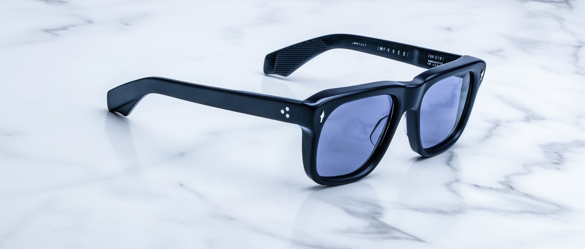 Jacques Marie Mage Yves black rectangular sunglasses with dark lenses, top view showing full frame and arms.