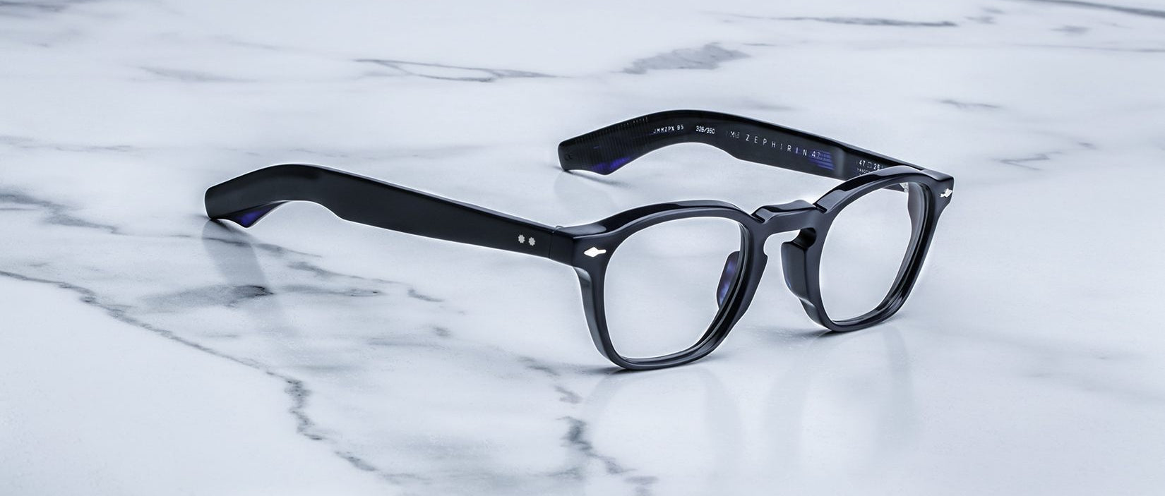Jacques Marie Mage Zephirin 47 black rectangular eyeglasses with thick frames, viewed from above.