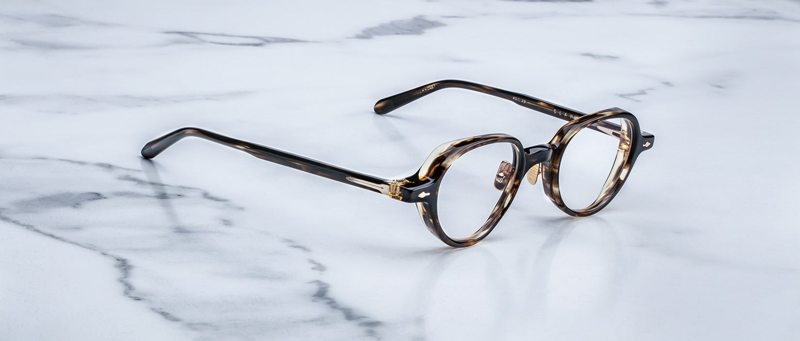 Jacques Marie Mage The Clark round eyeglasses, front view, classic design.