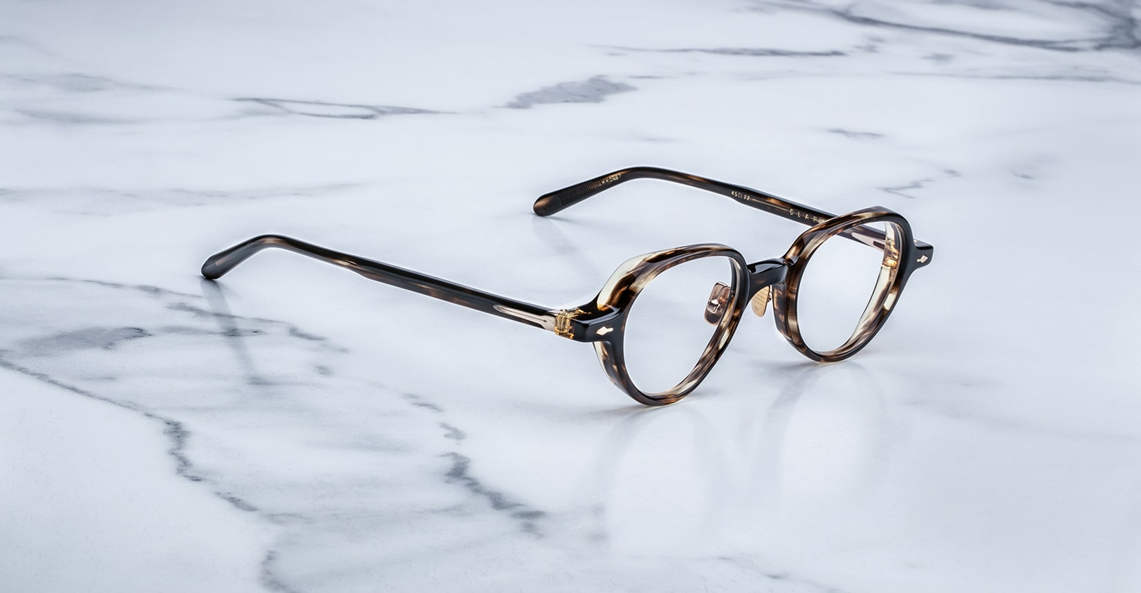 Jacques Marie Mage The Clark round eyeglasses, front view, classic design.