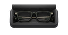 Even Realities G2 B Smart Eyeglasses in black open case, top view showing rectangular frames and neatly arranged arms.