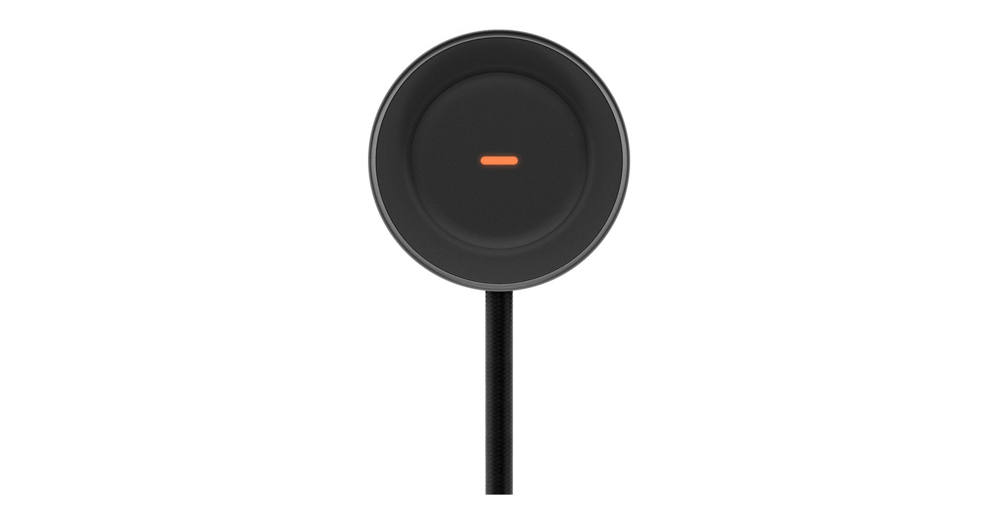 Even Realities R1 Ring wireless charging pad, black and circular with a cord and visible orange indicator, top view.