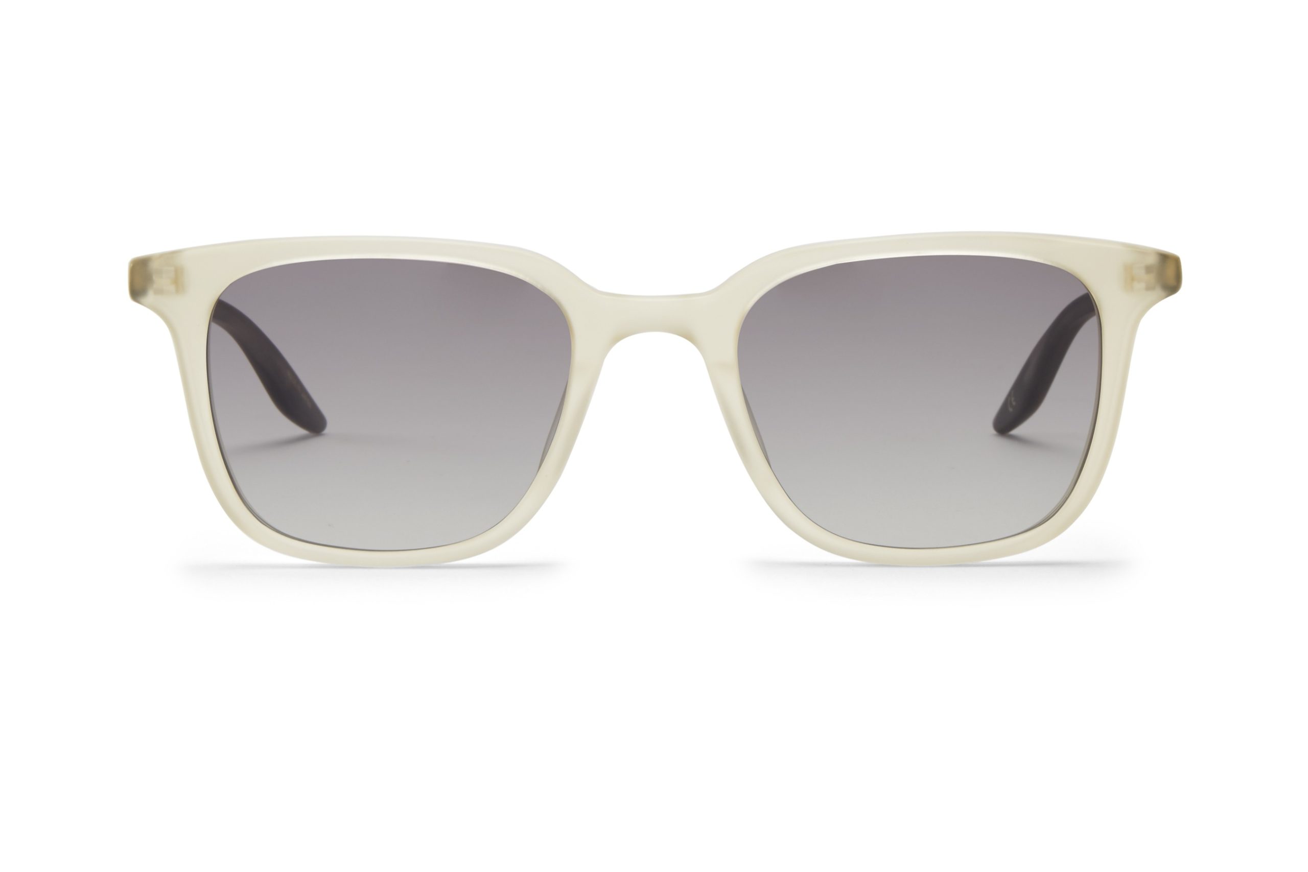 Front view of square-shaped sunglasses with light beige translucent frames and dark gradient lenses, displayed on a white background.