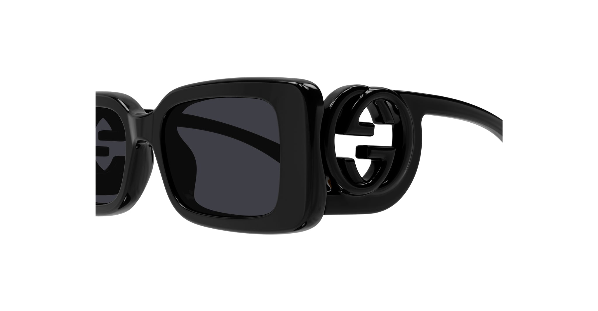 Close-up of Gucci GG1325S black sunglasses, thick frames, side view showing interlocking double G logo on the arm.
