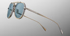 Jacques Marie Mage 755M sunglasses with gold rims, blue lenses, and thin temples, front view.