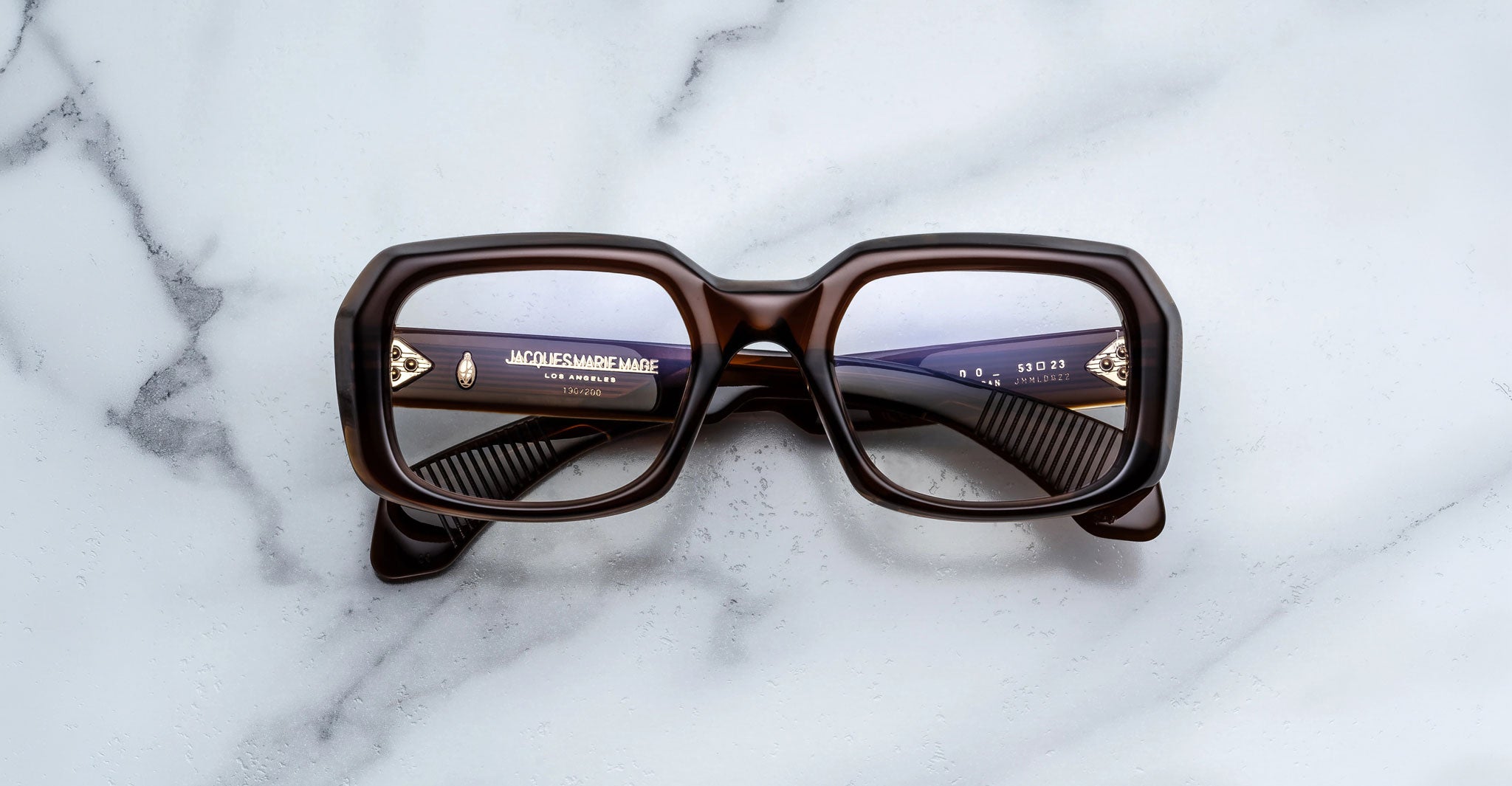 Jacques Marie Mage Aldo square brown eyeglasses with reflective lenses, front view.