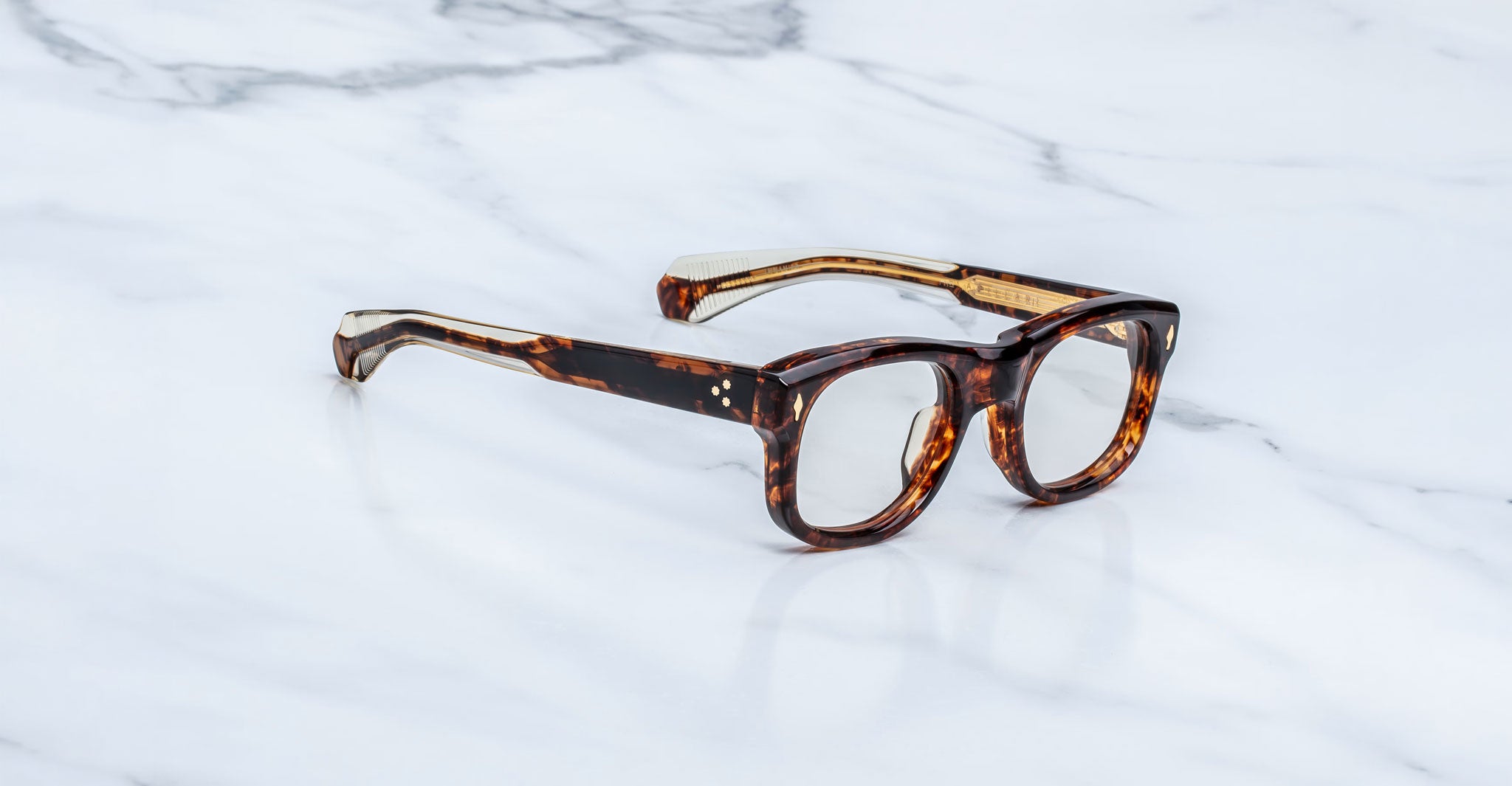 Jacques Marie Mage Amilcar eyeglasses with thick acetate frames, top view.
