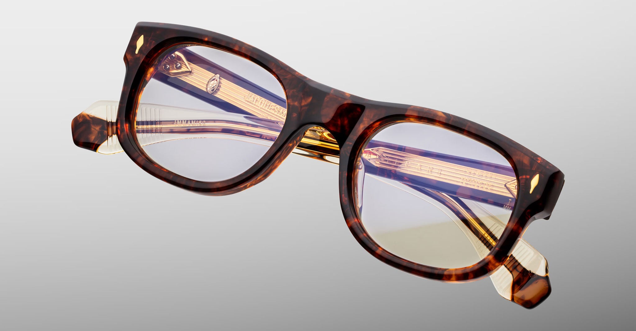 Jacques Marie Mage Amilcar tortoiseshell rectangular eyeglasses with clear and yellow lenses, front view.