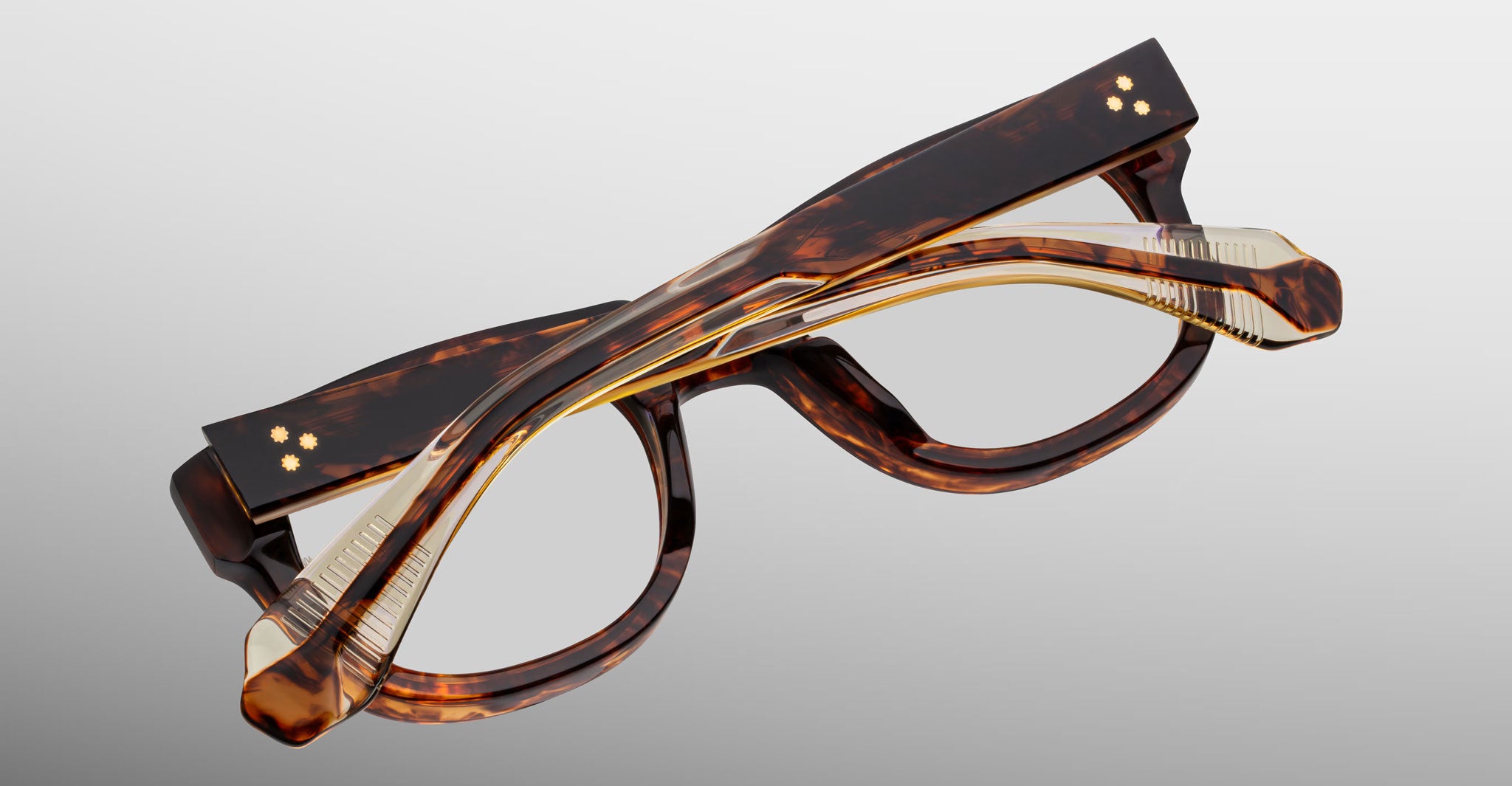 Jacques Marie Mage Amilcar tortoiseshell eyeglasses, folded, side view.