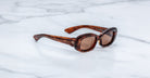 Jacques Marie Mage Ann in Bourbon, side angle view highlighting sculpted temples and layered acetate pattern