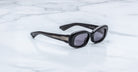 Jacques Marie Mage Ann in Raven black, side angle view highlighting thick temples and engraved wirecore detail